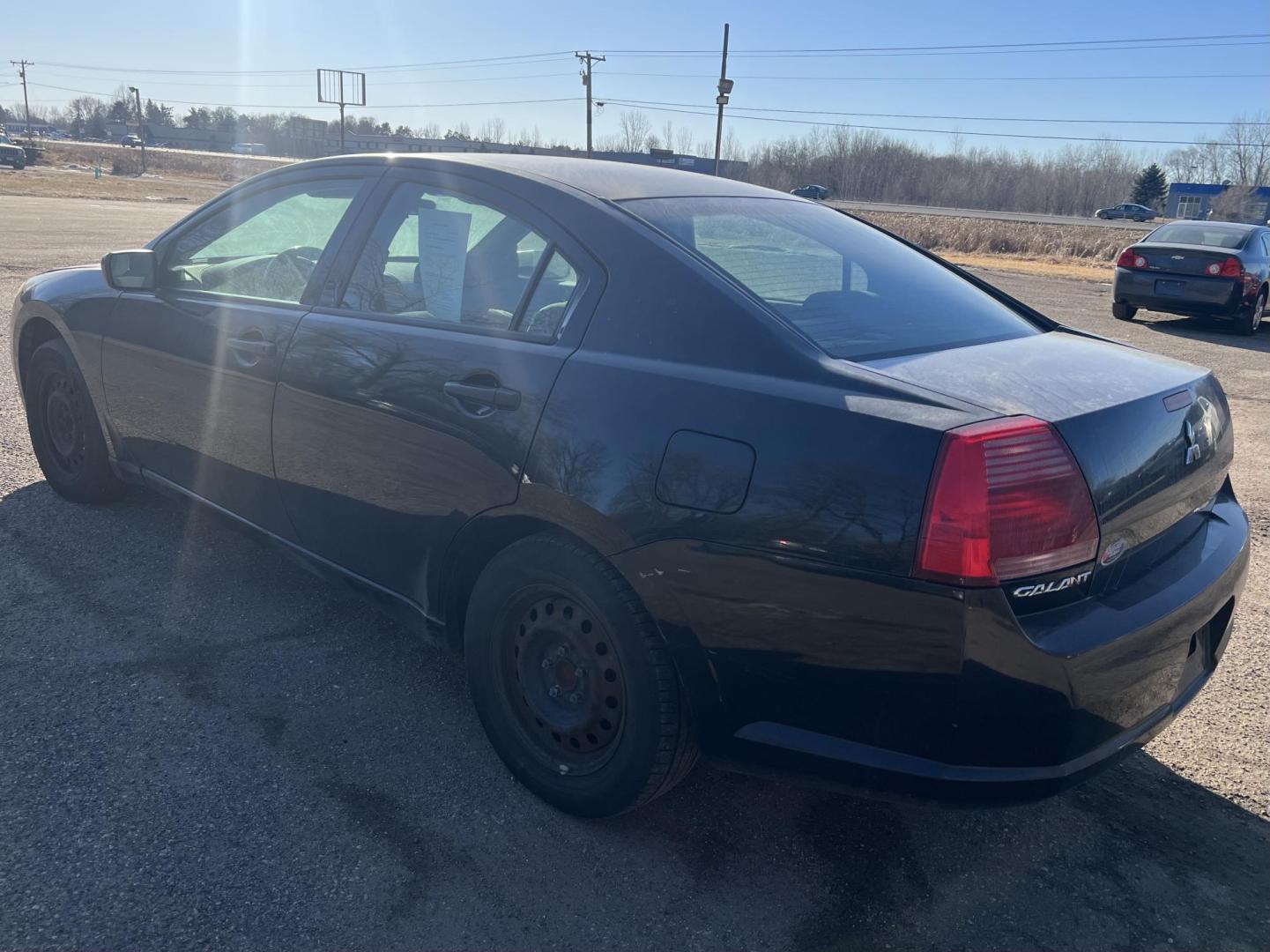 2006 Black Mitsubishi Galant DE (4A3AB26FX6E) with an 2.4L L4 SOHC 16V engine, 4-Speed Automatic Overdrive transmission, located at 17255 hwy 65 NE, Ham Lake, MN, 55304, 0.000000, 0.000000 - Photo#2