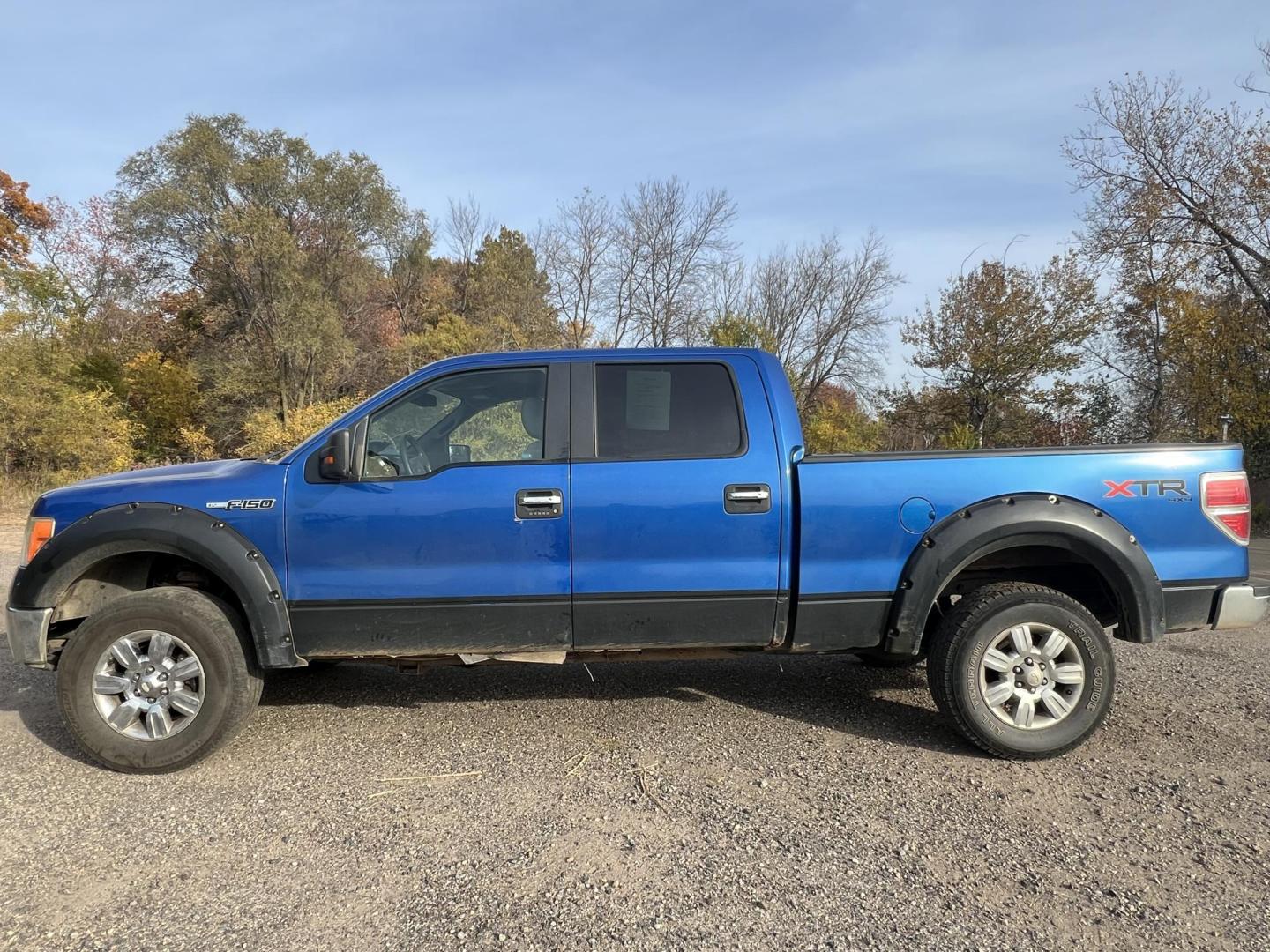 2010 Blue Ford F-150 Lariat SuperCrew 5.5-ft. Bed 4WD (1FTFW1EV1AF) with an 5.4L V8 SOHC 24V FFV engine, 4-Speed Automatic transmission, located at 17255 hwy 65 NE, Ham Lake, MN, 55304, 0.000000, 0.000000 - Photo#2