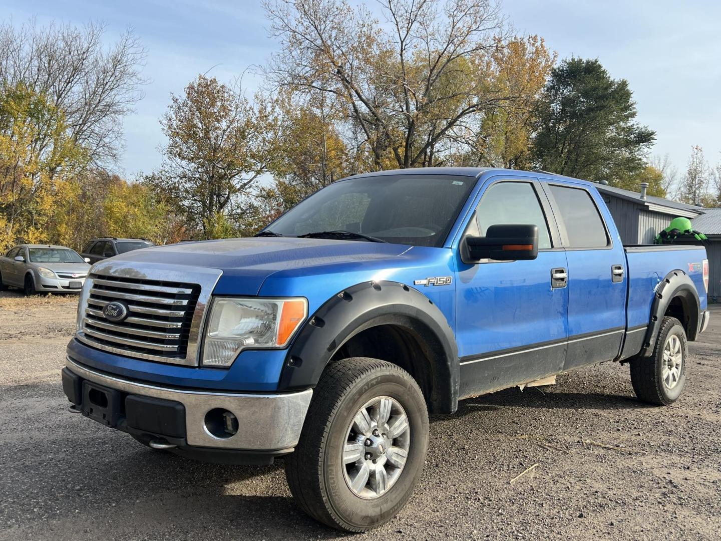 2010 Blue Ford F-150 Lariat SuperCrew 5.5-ft. Bed 4WD (1FTFW1EV1AF) with an 5.4L V8 SOHC 24V FFV engine, 4-Speed Automatic transmission, located at 17255 hwy 65 NE, Ham Lake, MN, 55304, 0.000000, 0.000000 - Photo#1