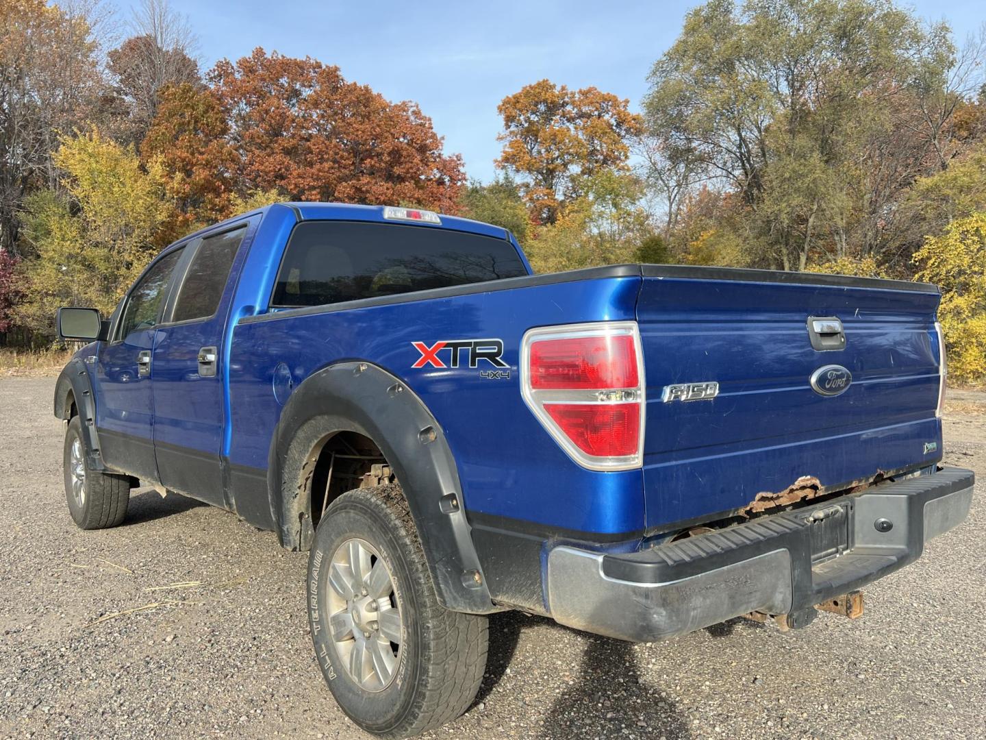 2010 Blue Ford F-150 Lariat SuperCrew 5.5-ft. Bed 4WD (1FTFW1EV1AF) with an 5.4L V8 SOHC 24V FFV engine, 4-Speed Automatic transmission, located at 17255 hwy 65 NE, Ham Lake, MN, 55304, 0.000000, 0.000000 - Photo#3