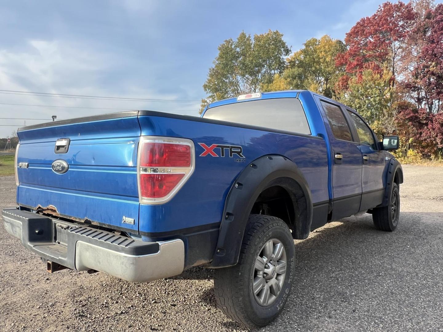 2010 Blue Ford F-150 Lariat SuperCrew 5.5-ft. Bed 4WD (1FTFW1EV1AF) with an 5.4L V8 SOHC 24V FFV engine, 4-Speed Automatic transmission, located at 17255 hwy 65 NE, Ham Lake, MN, 55304, 0.000000, 0.000000 - Photo#5