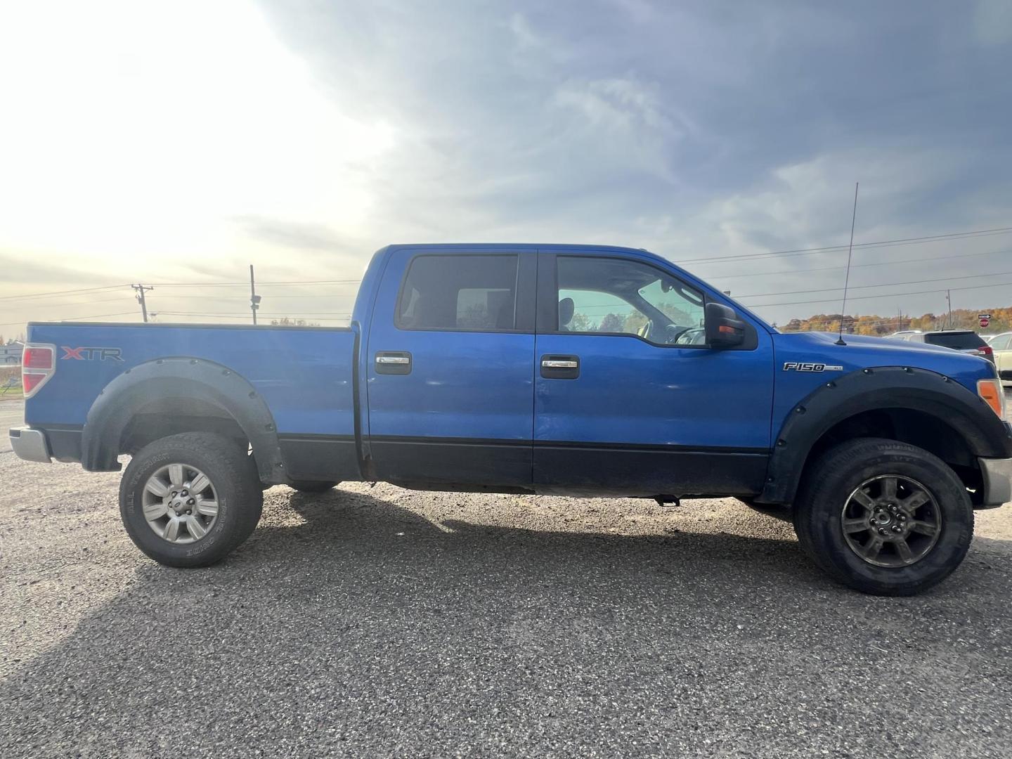 2010 Blue Ford F-150 Lariat SuperCrew 5.5-ft. Bed 4WD (1FTFW1EV1AF) with an 5.4L V8 SOHC 24V FFV engine, 4-Speed Automatic transmission, located at 17255 hwy 65 NE, Ham Lake, MN, 55304, 0.000000, 0.000000 - Photo#6