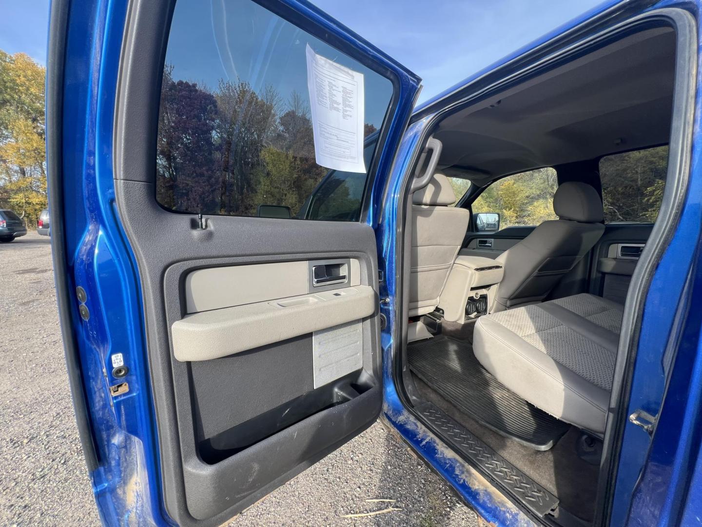 2010 Blue Ford F-150 Lariat SuperCrew 5.5-ft. Bed 4WD (1FTFW1EV1AF) with an 5.4L V8 SOHC 24V FFV engine, 4-Speed Automatic transmission, located at 17255 hwy 65 NE, Ham Lake, MN, 55304, 0.000000, 0.000000 - Photo#10