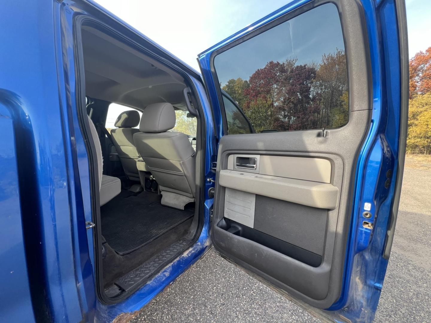 2010 Blue Ford F-150 Lariat SuperCrew 5.5-ft. Bed 4WD (1FTFW1EV1AF) with an 5.4L V8 SOHC 24V FFV engine, 4-Speed Automatic transmission, located at 17255 hwy 65 NE, Ham Lake, MN, 55304, 0.000000, 0.000000 - Photo#11