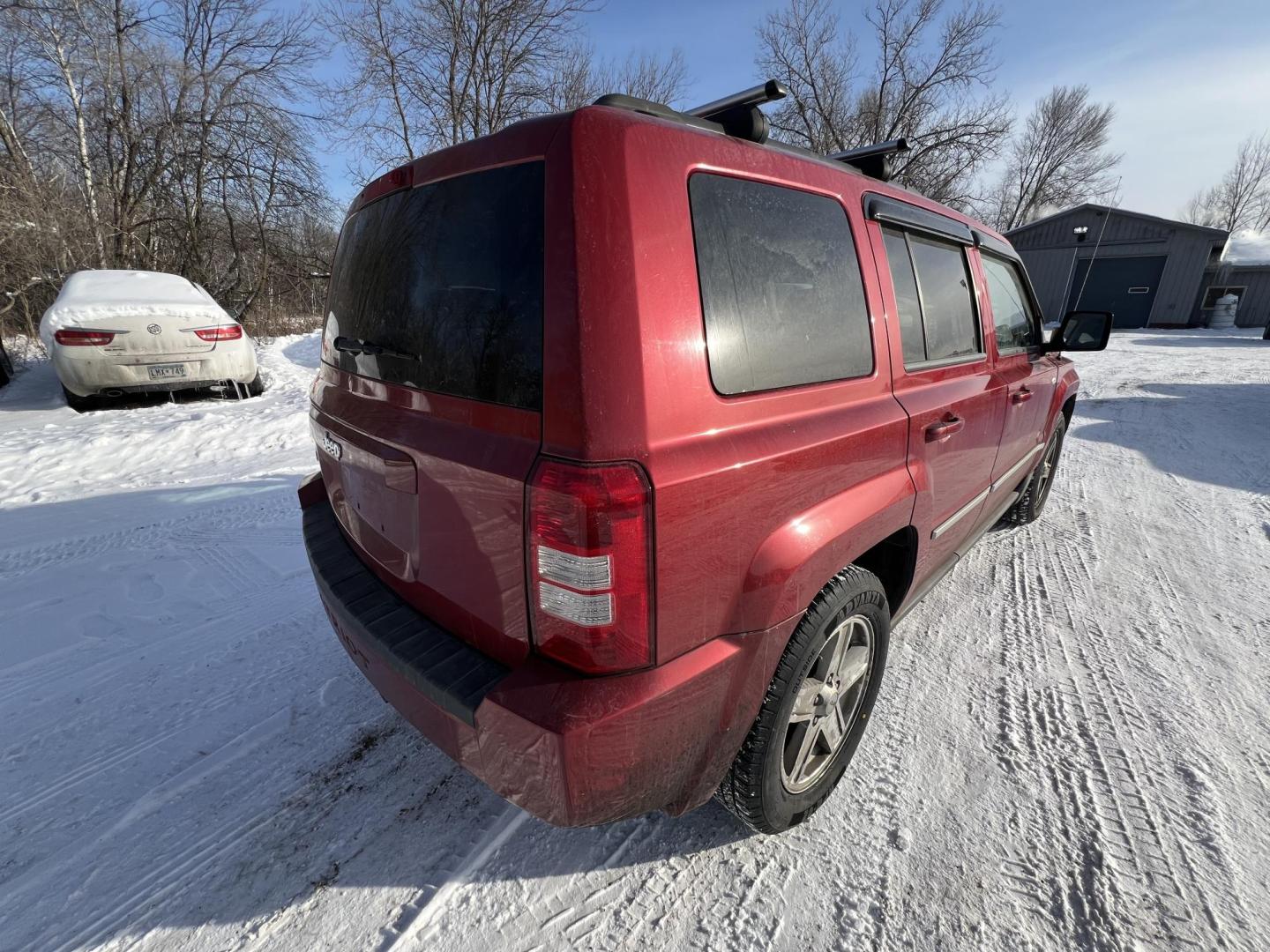 2010 Jeep Patriot Sport 4WD (1J4NF1GB6AD) with an 2.4L L4 DOHC 16V engine, located at 17255 hwy 65 NE, Ham Lake, MN, 55304, 0.000000, 0.000000 - Photo#4