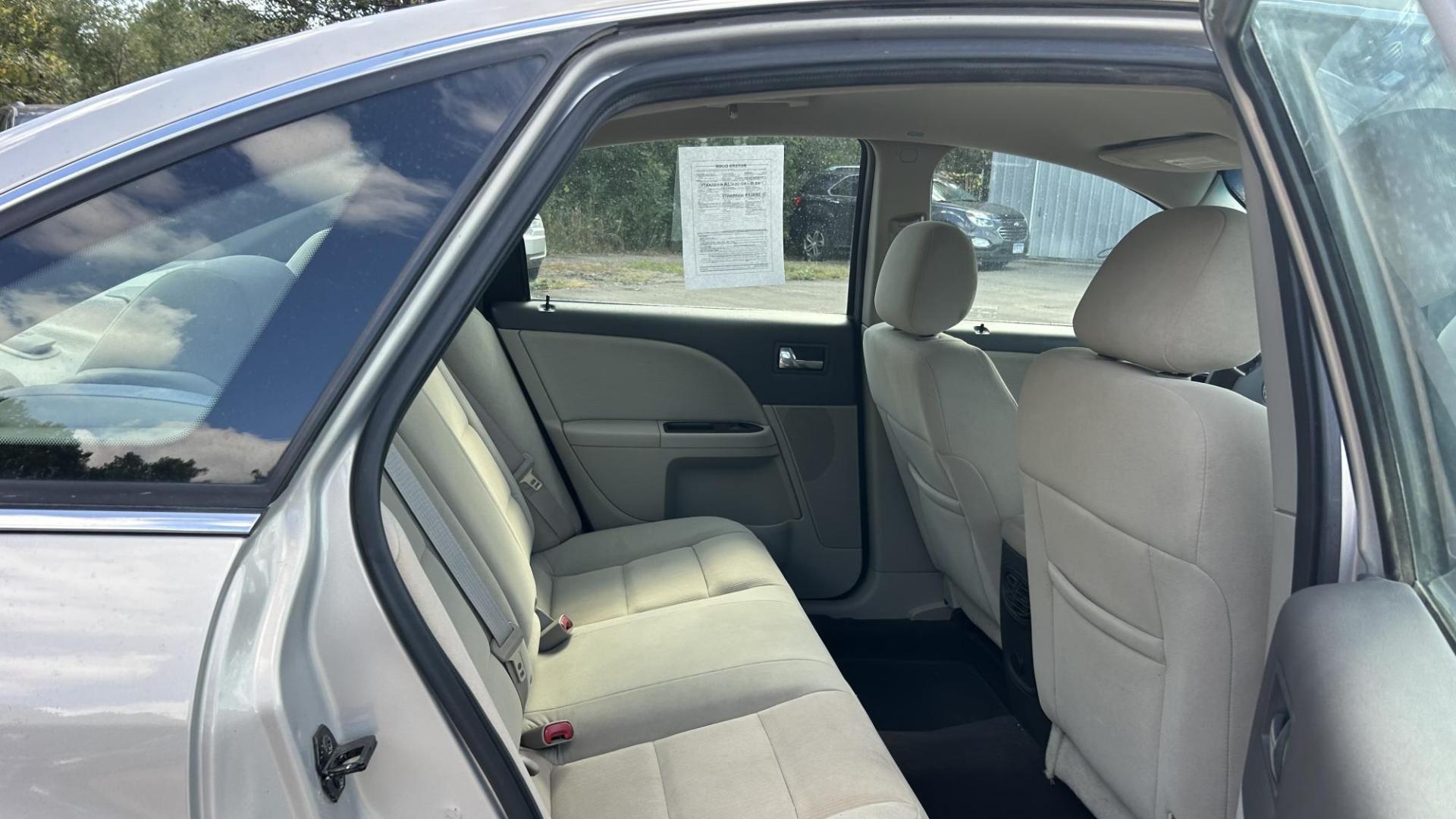 2009 Ford Taurus SEL FWD (1FAHP24W29G) with an 3.5L V6 DOHC 24V engine, 6-Speed Automatic transmission, located at 17255 hwy 65 NE, Ham Lake, MN, 55304, 0.000000, 0.000000 - Photo#13