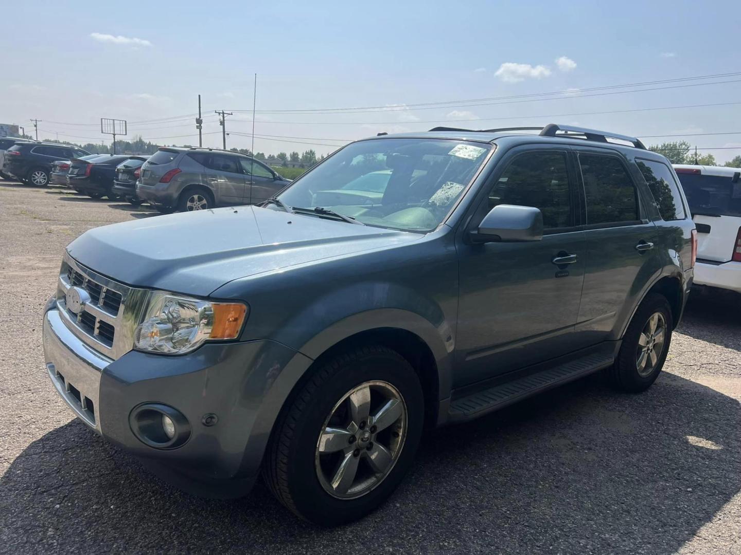 2012 Ford Escape Limited 4WD (1FMCU9E76CK) with an 2.5L L4 DOHC 16V engine, 6-Speed Automatic transmission, located at 17255 hwy 65 NE, Ham Lake, MN, 55304, 0.000000, 0.000000 - Photo#0