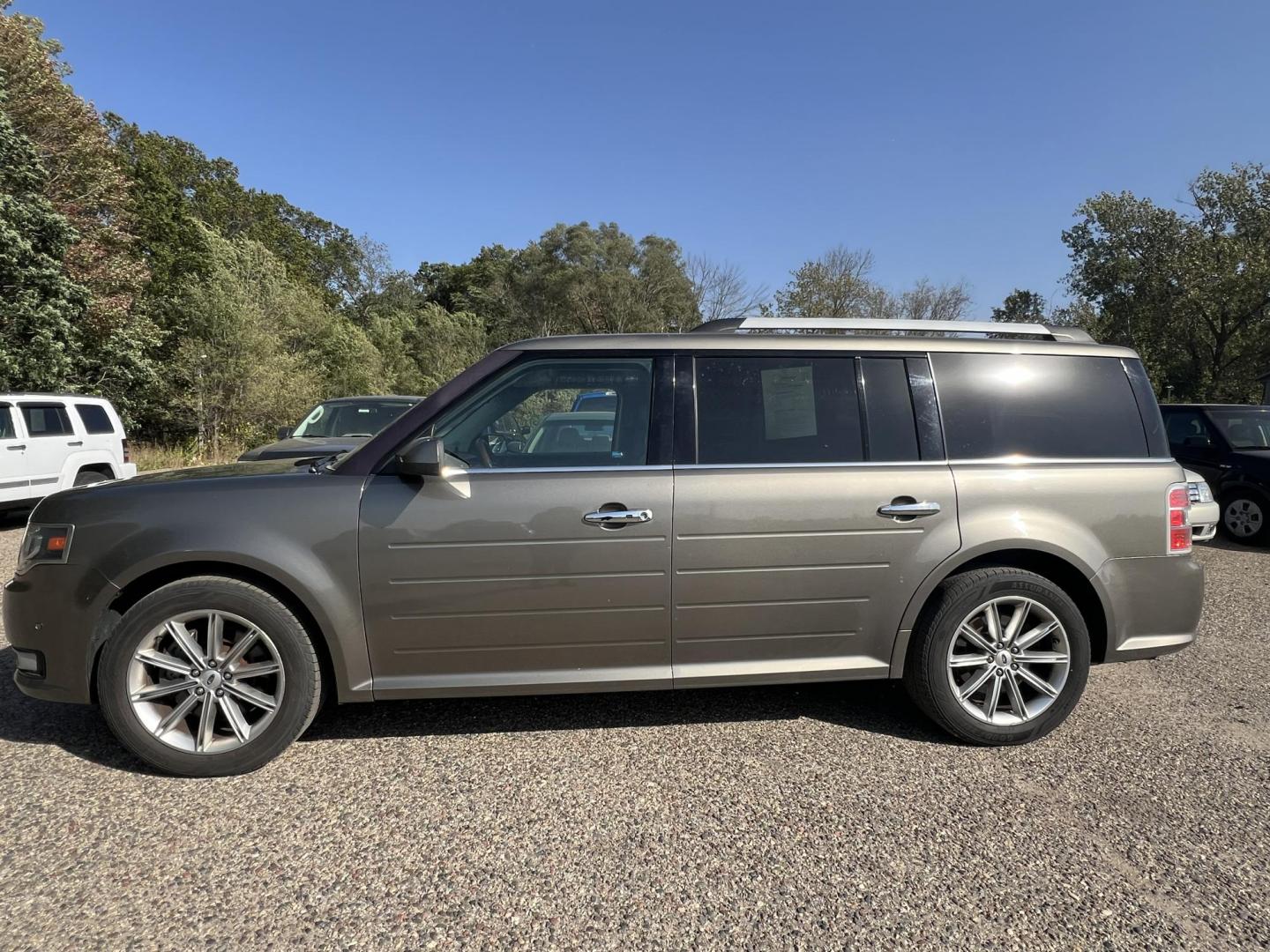 2014 Tan /Black Ford Flex Limited FWD (2FMGK5D89EB) with an 3.5L V6 DOHC 24V engine, 6-Speed Automatic Overdrive transmission, located at 17255 hwy 65 NE, Ham Lake, MN, 55304, 0.000000, 0.000000 - Photo#1