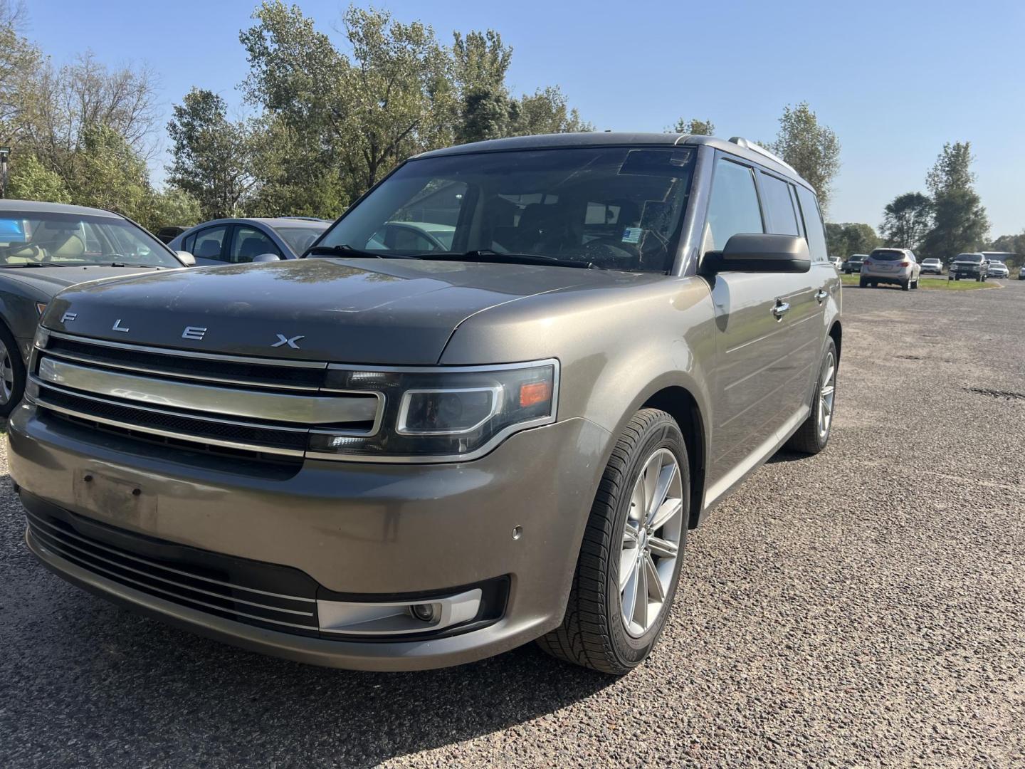 2014 Tan /Black Ford Flex Limited FWD (2FMGK5D89EB) with an 3.5L V6 DOHC 24V engine, 6-Speed Automatic Overdrive transmission, located at 17255 hwy 65 NE, Ham Lake, MN, 55304, 0.000000, 0.000000 - Photo#0