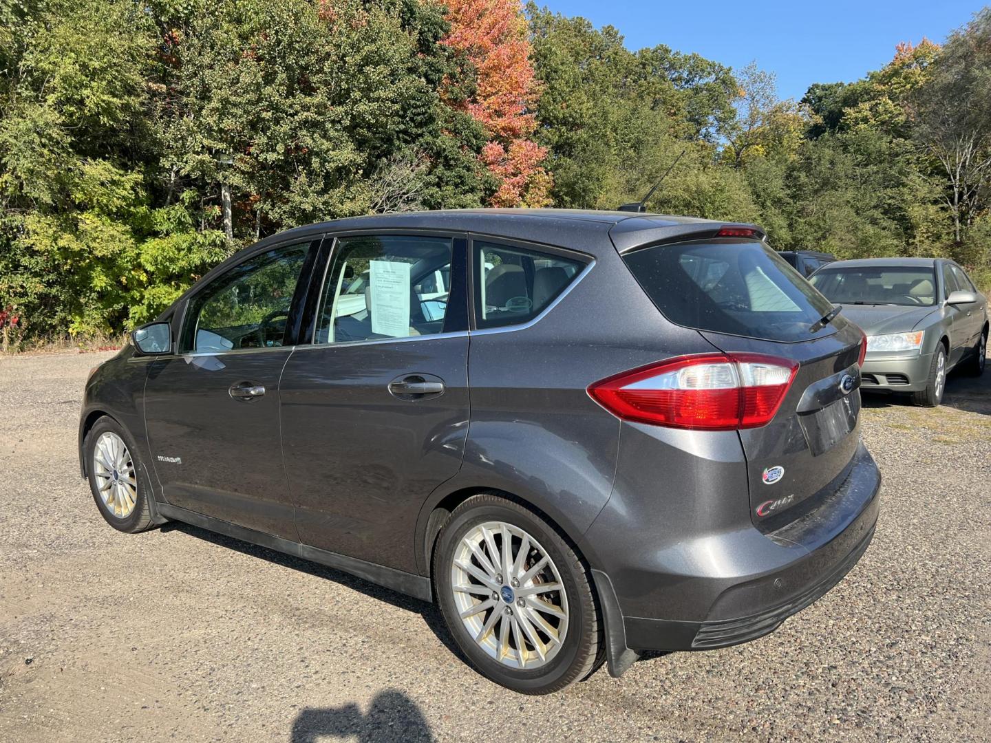 2013 Ford C-Max SEL (1FADP5BU9DL) with an 2.0L L4 DOHC 16V HYBRID engine, Continuously Variable Transmission transmission, located at 17255 hwy 65 NE, Ham Lake, MN, 55304, 0.000000, 0.000000 - Photo#3