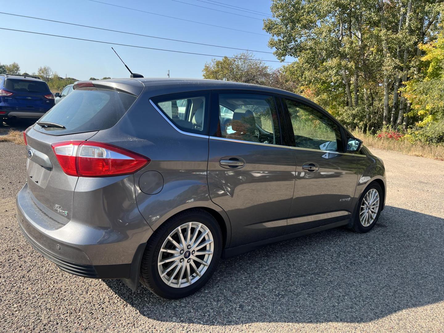 2013 Ford C-Max SEL (1FADP5BU9DL) with an 2.0L L4 DOHC 16V HYBRID engine, Continuously Variable Transmission transmission, located at 17255 hwy 65 NE, Ham Lake, MN, 55304, 0.000000, 0.000000 - Photo#5