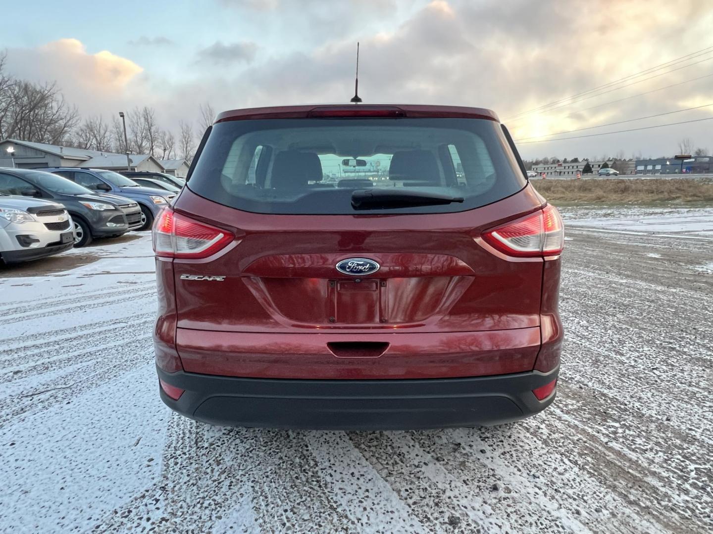 2014 Orange /Black Ford Escape S FWD (1FMCU0F79EU) with an 2.5L L4 DOHC 16V engine, 6-Speed Automatic transmission, located at 17255 hwy 65 NE, Ham Lake, MN, 55304, 0.000000, 0.000000 - Photo#3