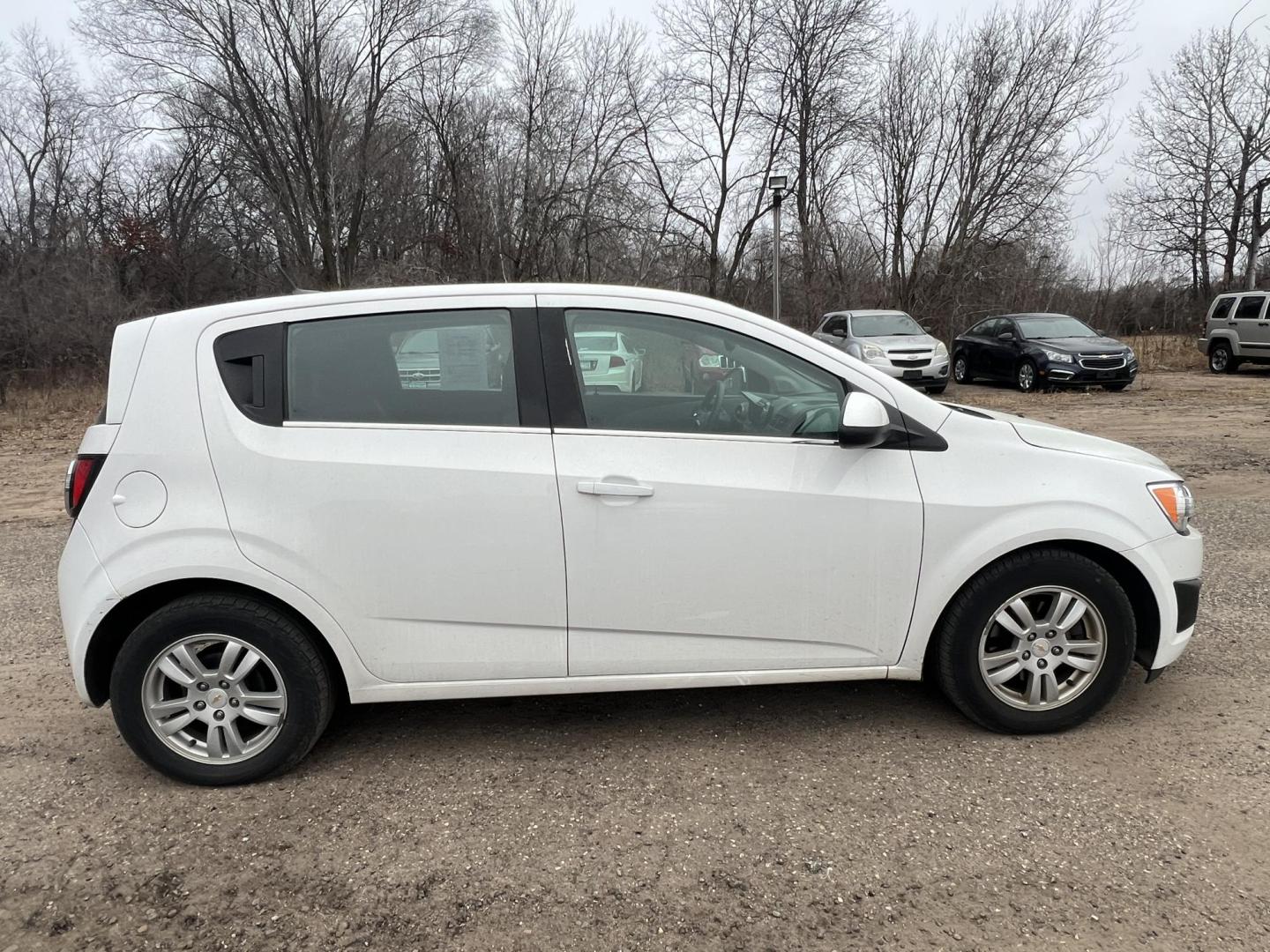 2012 Chevrolet Sonic 1LT 5-Door (1G1JD6SH4C4) with an 1.8L L4 DOHC 24V FFV engine, MANUAL transmission, located at 17255 hwy 65 NE, Ham Lake, MN, 55304, 0.000000, 0.000000 - Photo#5