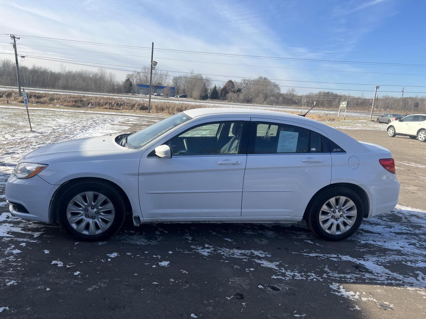 2012 Chrysler 200 LX (1C3CCBAB9CN) with an 2.4L L4 DOHC 16V engine, 6-Speed Automatic transmission, located at 17255 hwy 65 NE, Ham Lake, MN, 55304, 0.000000, 0.000000 - Photo#1