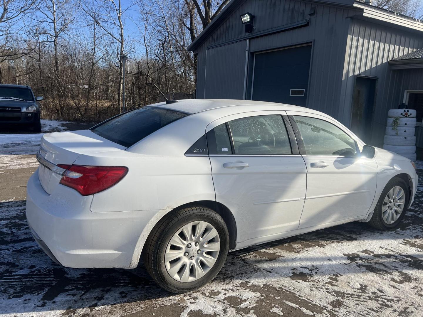 2012 Chrysler 200 LX (1C3CCBAB9CN) with an 2.4L L4 DOHC 16V engine, 6-Speed Automatic transmission, located at 17255 hwy 65 NE, Ham Lake, MN, 55304, 0.000000, 0.000000 - Photo#7