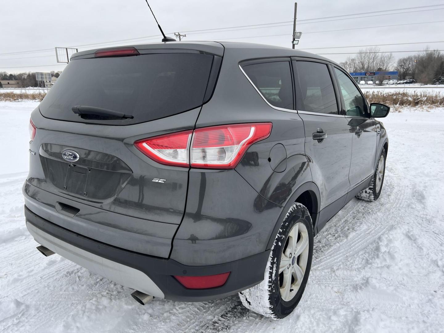 2015 Ford Escape SE FWD (1FMCU0G79FU) with an 2.5L L4 DOHC 16V engine, 6-Speed Automatic transmission, located at 17255 hwy 65 NE, Ham Lake, MN, 55304, 0.000000, 0.000000 - Photo#4