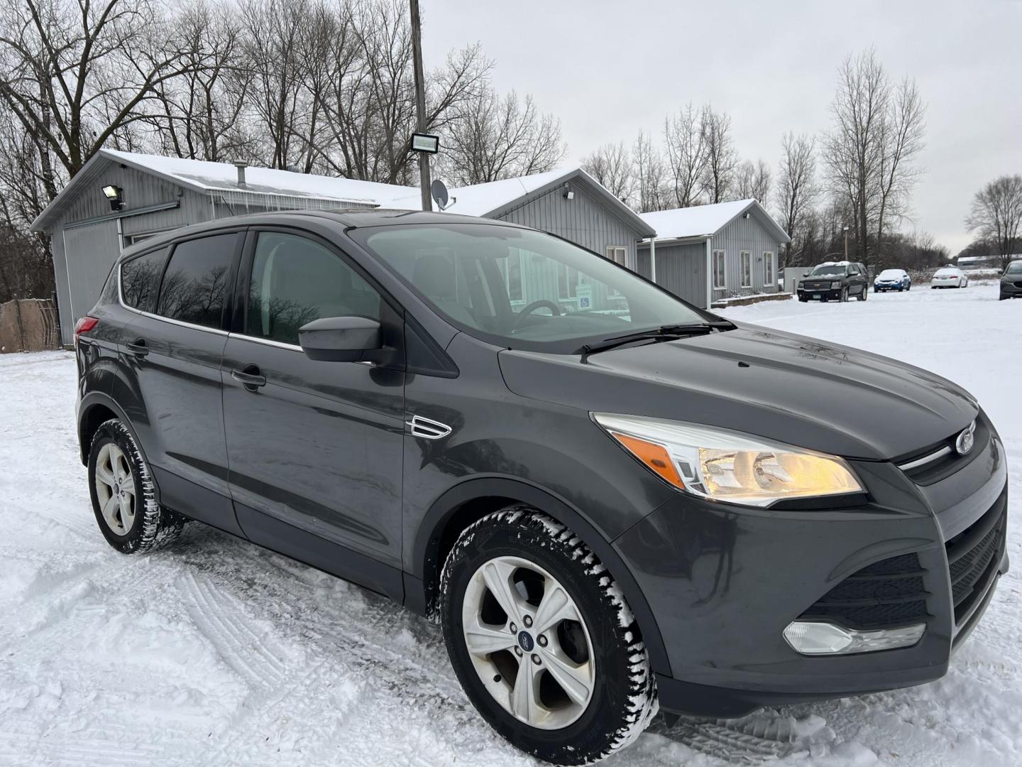 2015 Ford Escape SE FWD (1FMCU0G79FU) with an 2.5L L4 DOHC 16V engine, 6-Speed Automatic transmission, located at 17255 hwy 65 NE, Ham Lake, MN, 55304, 0.000000, 0.000000 - Photo#6