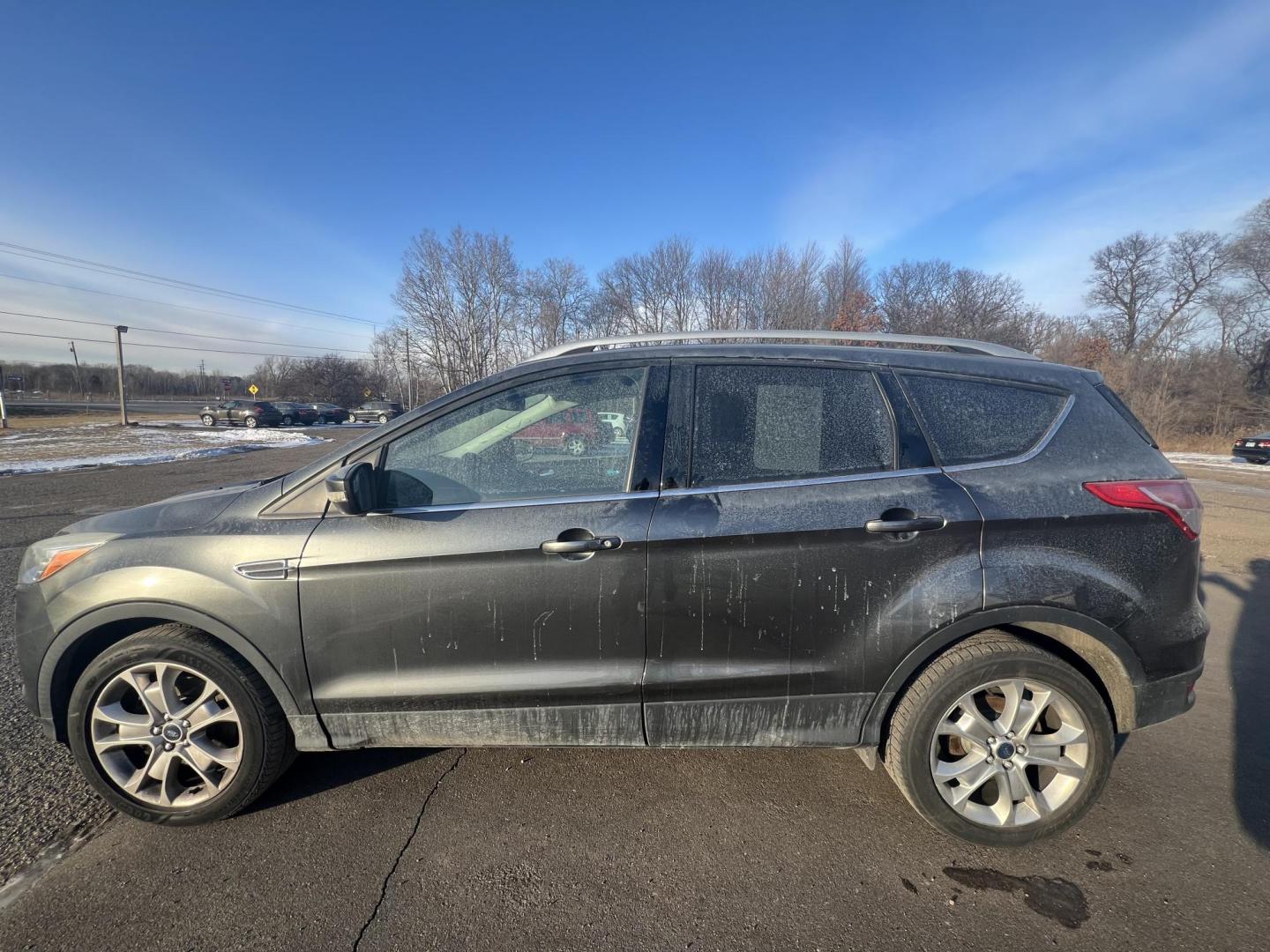 2015 Ford Escape Titanium FWD (1FMCU0J97FU) with an 2.0L L4 DOHC 16V engine, 6-Speed Automatic transmission, located at 17255 hwy 65 NE, Ham Lake, MN, 55304, 0.000000, 0.000000 - Photo#1