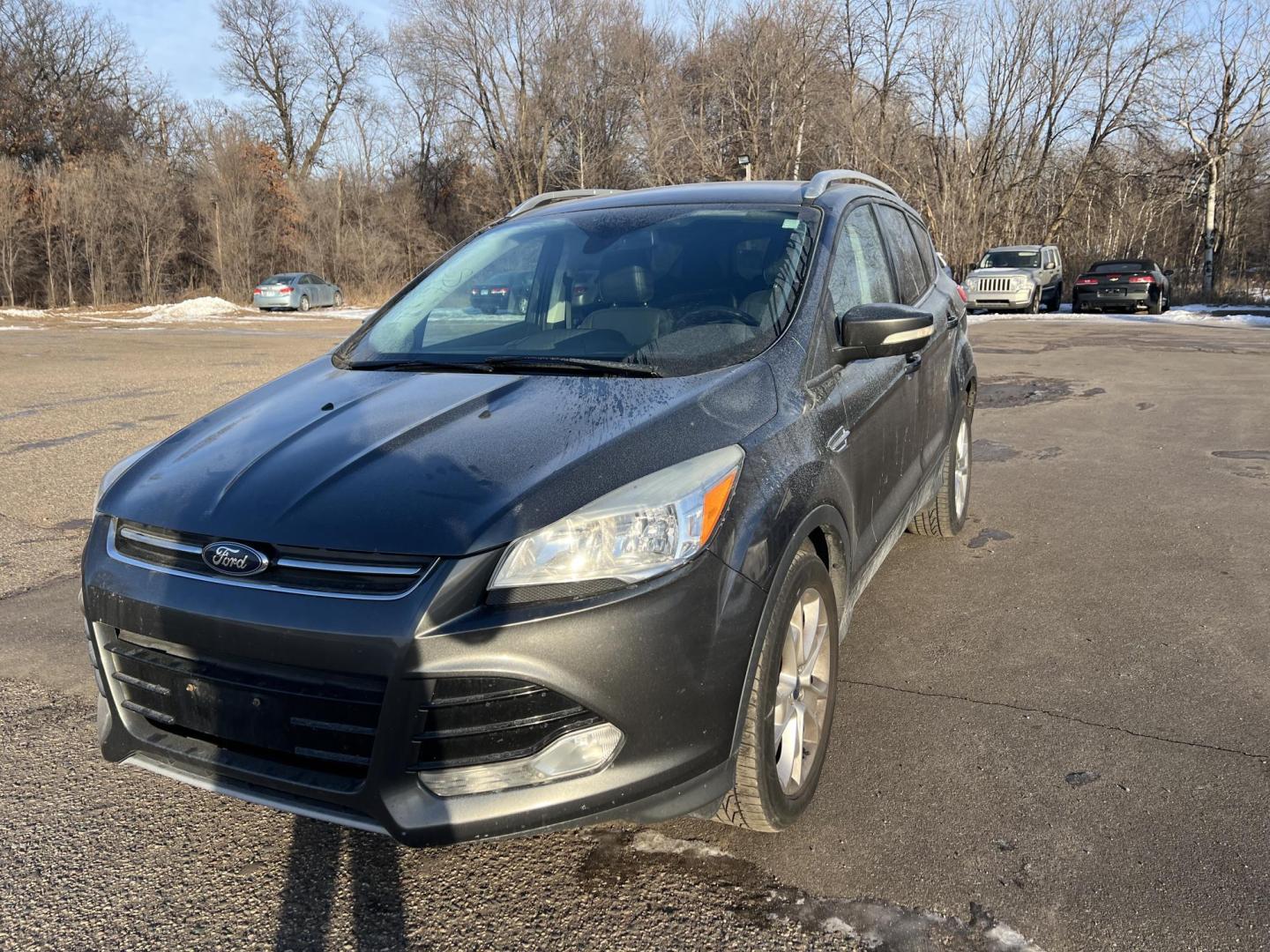 2015 Ford Escape Titanium FWD (1FMCU0J97FU) with an 2.0L L4 DOHC 16V engine, 6-Speed Automatic transmission, located at 17255 hwy 65 NE, Ham Lake, MN, 55304, 0.000000, 0.000000 - Photo#0