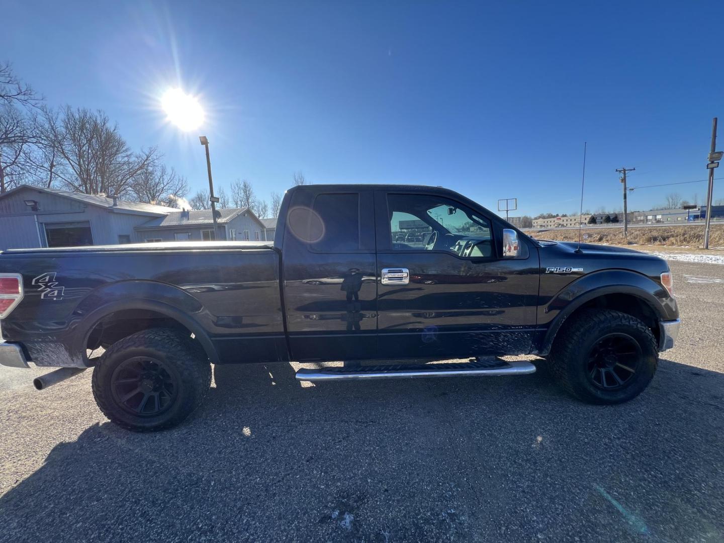 2013 Ford F-150 Lariat SuperCab 6.5-ft. Bed 4WD (1FTFX1EF1DF) with an 5.0L V8 engine, 6-Speed Automatic transmission, located at 17255 hwy 65 NE, Ham Lake, MN, 55304, 0.000000, 0.000000 - Photo#5