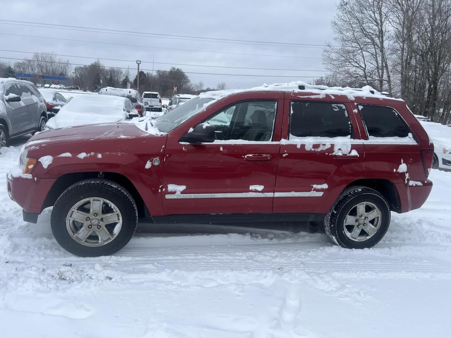 2005 Red Jeep Grand Cherokee Limited 4WD (1J4HR58285C) with an 5.7L V8 OHV 16V engine, 5-Speed Automatic Overdrive transmission, located at 17255 hwy 65 NE, Ham Lake, MN, 55304, 0.000000, 0.000000 - Photo#1