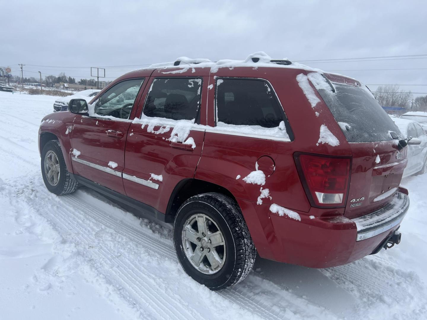 2005 Red Jeep Grand Cherokee Limited 4WD (1J4HR58285C) with an 5.7L V8 OHV 16V engine, 5-Speed Automatic Overdrive transmission, located at 17255 hwy 65 NE, Ham Lake, MN, 55304, 0.000000, 0.000000 - Photo#2