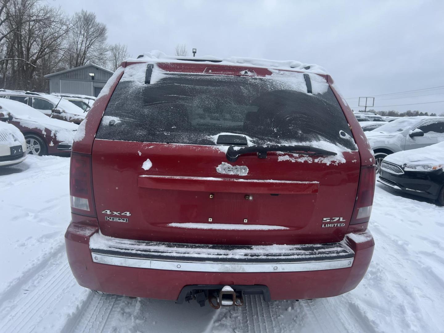 2005 Red Jeep Grand Cherokee Limited 4WD (1J4HR58285C) with an 5.7L V8 OHV 16V engine, 5-Speed Automatic Overdrive transmission, located at 17255 hwy 65 NE, Ham Lake, MN, 55304, 0.000000, 0.000000 - Photo#3